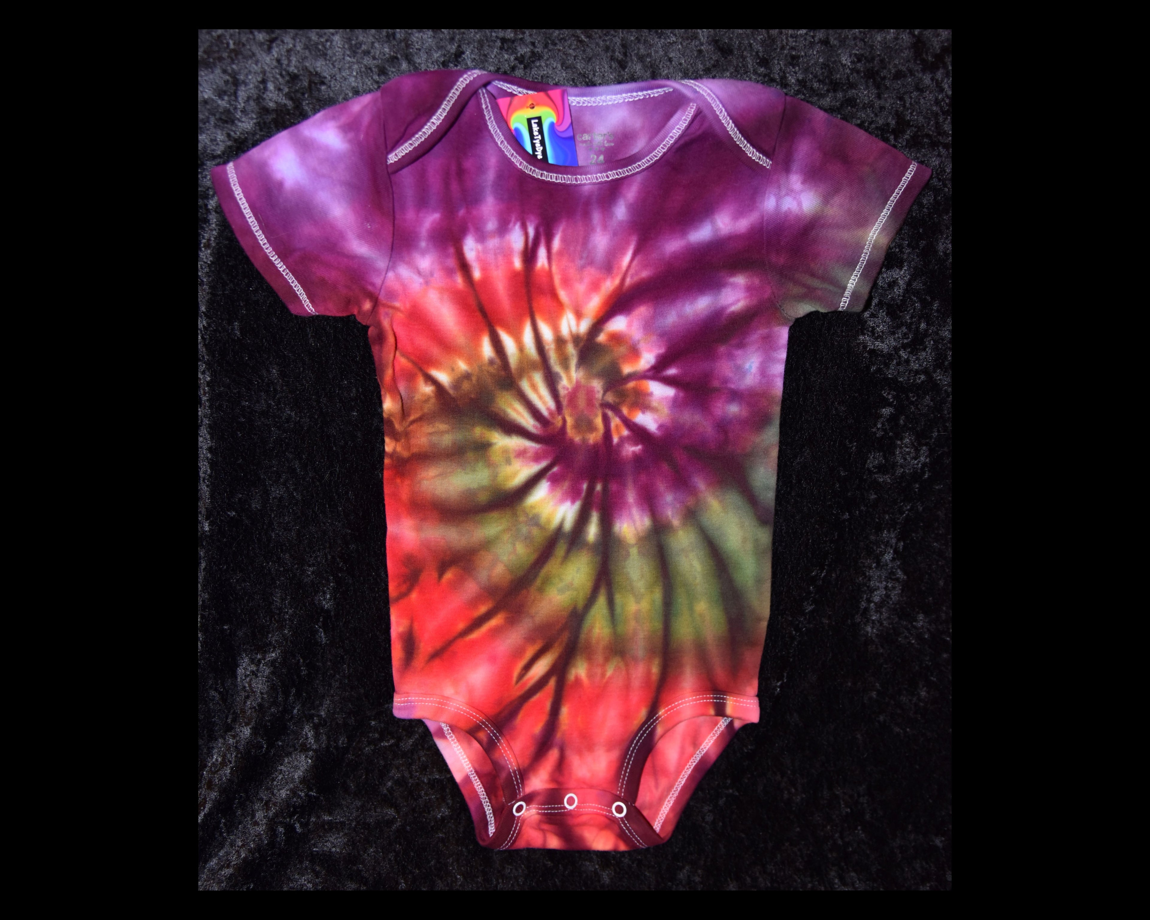 24 mo. bodysuit - Purple, Red, Green spiral